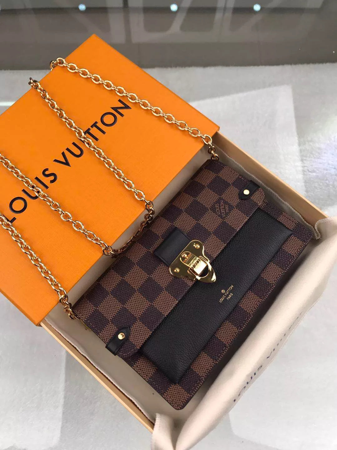 LOUIS VUITTON VAVIN CHAIN WALLET
